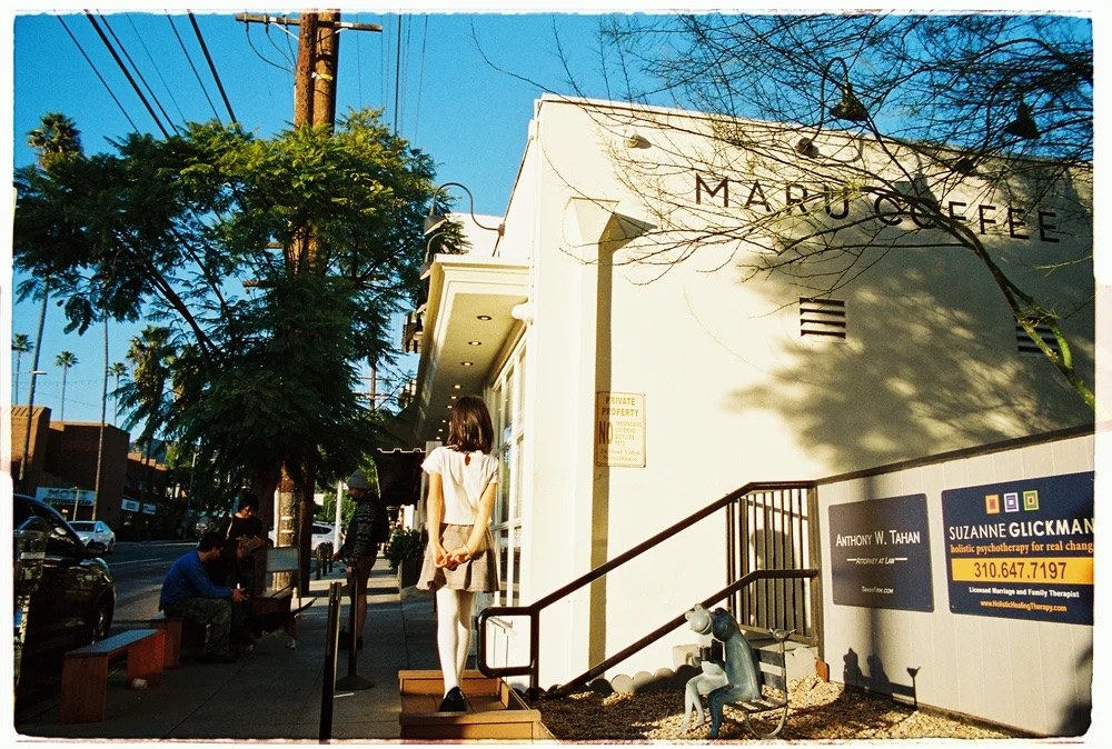 The Hillhurst Avenue storefront at Maru Coffee with the Maru Coffee sign